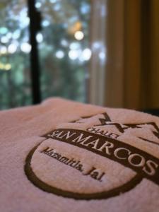 a towel with the words anaesthesiologist written on it at Chalet San Marcos in Mazamitla