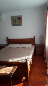 Postel nebo postele na pokoji v ubytování Teona-Apartments