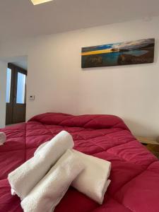 Ένα ή περισσότερα κρεβάτια σε δωμάτιο στο 144 via Roma