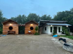 Foto sihtkohas Chat Trakan asuva majutusasutuse บ้านสวนพงษ์ศิริ Baan Suan Pongsiri galeriist