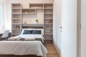 Ένα ή περισσότερα κρεβάτια σε δωμάτιο στο Bright & Modern 4 bedrooms Apartment in Center