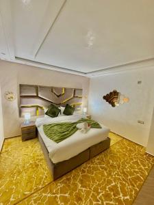 Ένα ή περισσότερα κρεβάτια σε δωμάτιο στο Villa Palmiers 4ch piscine ensoleillée 20mn Agadir +97 φωτογραφίες