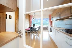 Kuchyň nebo kuchyňský kout v ubytování Panoramaweg