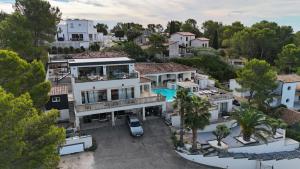 an aerial view of a house at L'Eden Bleu a Langlade in Langlade