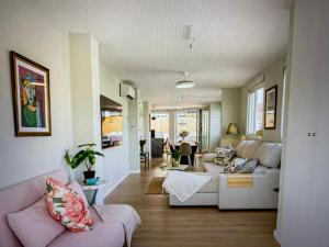 a living room with a couch and a table at Malaga entire rental unit in Málaga