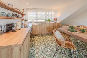 Η κουζίνα ή μικρή κουζίνα στο Seeapartment Untersee