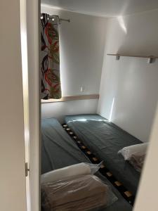 Postel nebo postele na pokoji v ubytování Mobil Home de luxe 6 pers