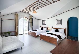 Postel nebo postele na pokoji v ubytování LUCKY MIO VILLA LUXURY + 18 fotografií