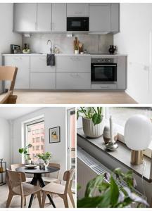 ストックホルムにあるBright and modern studio with a great locationの白いキャビネットとテーブルと椅子のあるキッチン