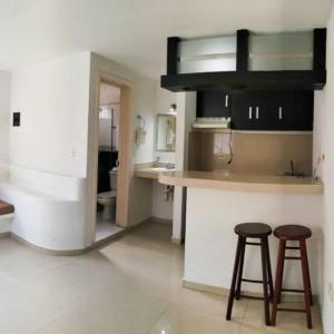 Una cocina o cocineta en Hotel Dos Mundos, Isla Cozumel