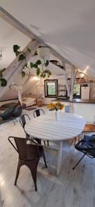 a room with a table and chairs in a tent at Małopolskie Swojskie in Olszyny