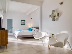 Postel nebo postele na pokoji v ubytování For The Record by Acme House Company