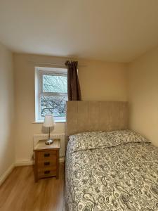 En eller flere senge i et værelse på Beaumont Court