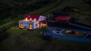 an overhead view of a house with lights on at Casa Espalamaca in Horta