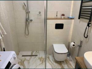 Koupelna v ubytování Lux Apartments + 8 fotografií