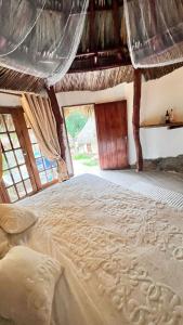 Кровать или кровати в номере TAWACA Junior +5 фотографий