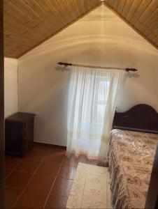 Postel nebo postele na pokoji v ubytování Casa das maravilhas