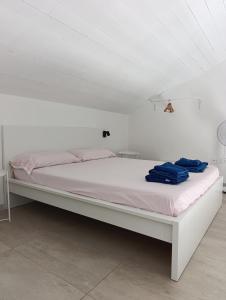 Postel nebo postele na pokoji v ubytování Borgata Relax