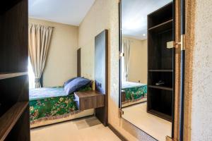 Ένα ή περισσότερα κρεβάτια σε δωμάτιο στο SJ7 Aparthotel +41 φωτογραφίες