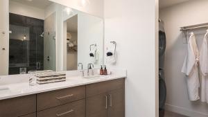 a bathroom with a sink and a mirror at Princetown Grande in Steamboat Springs +36 photos
