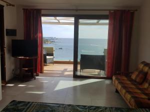 Μια τηλεόραση ή/και κέντρο ψυχαγωγίας στο Case vacanze Baia Luna