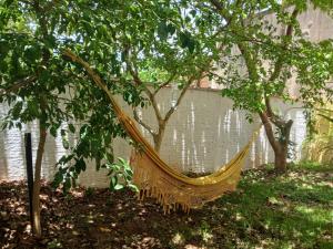 Κήπος έξω από το Quarto Aconchegante no Centro de Poços de Caldas - Pousada do Chico