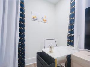 a white desk with a chair in a room at Manchaca 4 bedroom sleeps 10 Pool and Hot tub in Manchaca +73 photos