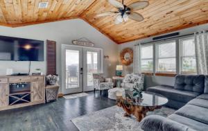 Et tv og/eller underholdning på Whitesands Beach House - South