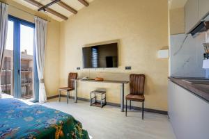 Μια τηλεόραση ή/και κέντρο ψυχαγωγίας στο SJ7 Aparthotel