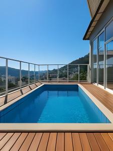 Bazén v ubytování Apt no Coração das Montanhas Capixabas nebo v jeho okolí