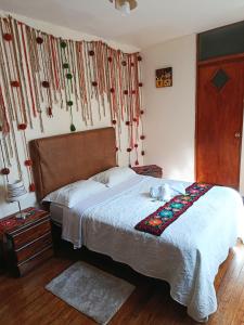Postel nebo postele na pokoji v ubytování Habitación Boutique Privada Centro de Cusco