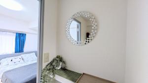 Postel nebo postele na pokoji v ubytování MIYAVI#201 3min walk Narimasu Station, 2 people, double bed, Tokyo's largest Don Quijote