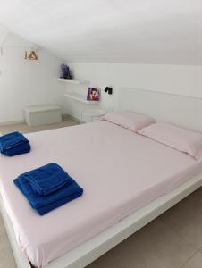 Postel nebo postele na pokoji v ubytování Borgata Relax