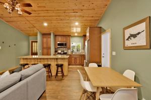 a living room with a couch and a table at Country Club Cabin #357 in Big Bear City +13 photos
