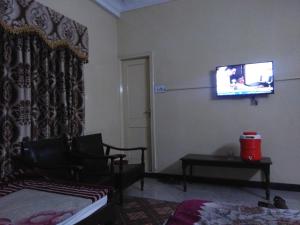 TV a/nebo společenská místnost v ubytování Rose Hotel