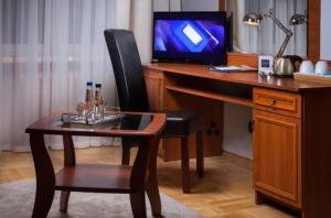 TV a/nebo společenská místnost v ubytování Hotel Cristal Park