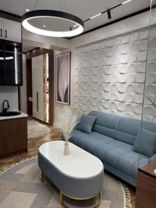 Posezení v ubytování Аренда квартиры #11 NRG U-Tower Rent an apartment