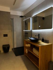 Koupelna v ubytování RomAir Residences + 4 fotografie