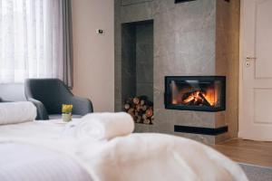 Ένα ή περισσότερα κρεβάτια σε δωμάτιο στο Noclegi Faryny