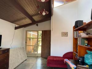 Χώρος καθιστικού στο Casinha bem localizada em meio a natureza