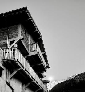a building with balconies on the side of it at Chalet Perle des Alpes in Peisey-Nancroix