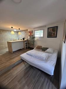 a bedroom with a bed and a desk in it at Casa Fritz in Llagostera