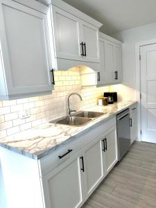 Kuchyň nebo kuchyňský kout v ubytování Newly built house in Stratford + 4 fotografie