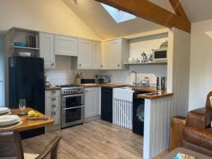 Η κουζίνα ή μικρή κουζίνα στο 1 Bed in Ullswater 94069
