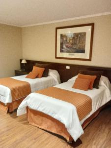 Ένα ή περισσότερα κρεβάτια σε δωμάτιο στο El casco de la Fundación Fangio