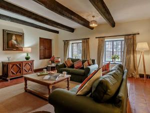 a living room with two couches and a coffee table at 2 Bed in Llanover 91242 in Abergavenny