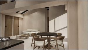 ein Wohnzimmer mit Tisch und Stühlen und einer Couch in der Unterkunft Moderno y luminoso apartamento de 3 habitaciones 314 in Medellín