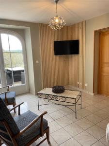 Μια τηλεόραση ή/και κέντρο ψυχαγωγίας στο Maison de campagne +9 φωτογραφίες