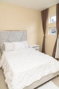 Ένα ή περισσότερα κρεβάτια σε δωμάτιο στο La Isla Royal - Marea Estelar