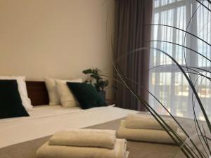 Ένα ή περισσότερα κρεβάτια σε δωμάτιο στο VIP AVALON Замарстинівська 55-Є